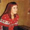 Carmen Kleinegris met rood bloesje